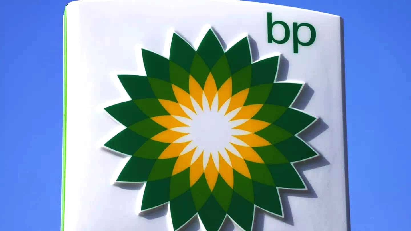 BP petrol station logo with green and yellow sunburst design.